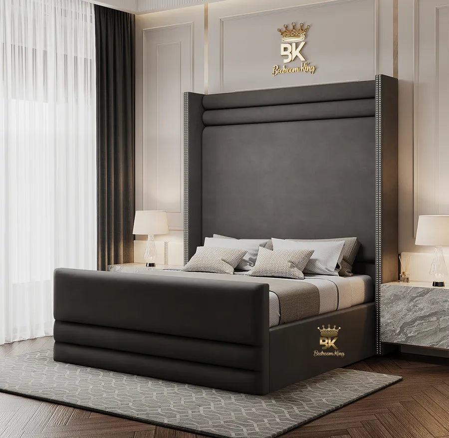 A gray upholstered wingback storage bed frame with a high headboard