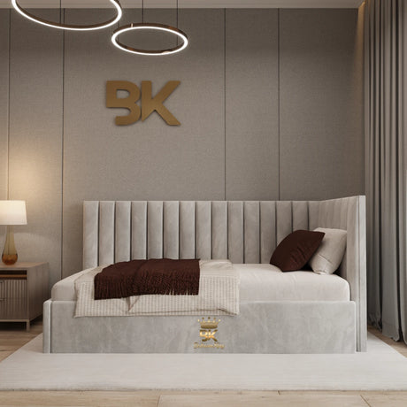 Gray upholstered kids bed with brown pillows in a room made by Bedroomking