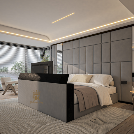 Upholstered storage bed with wall panels, integrated TV lift, and decorative mirrors.