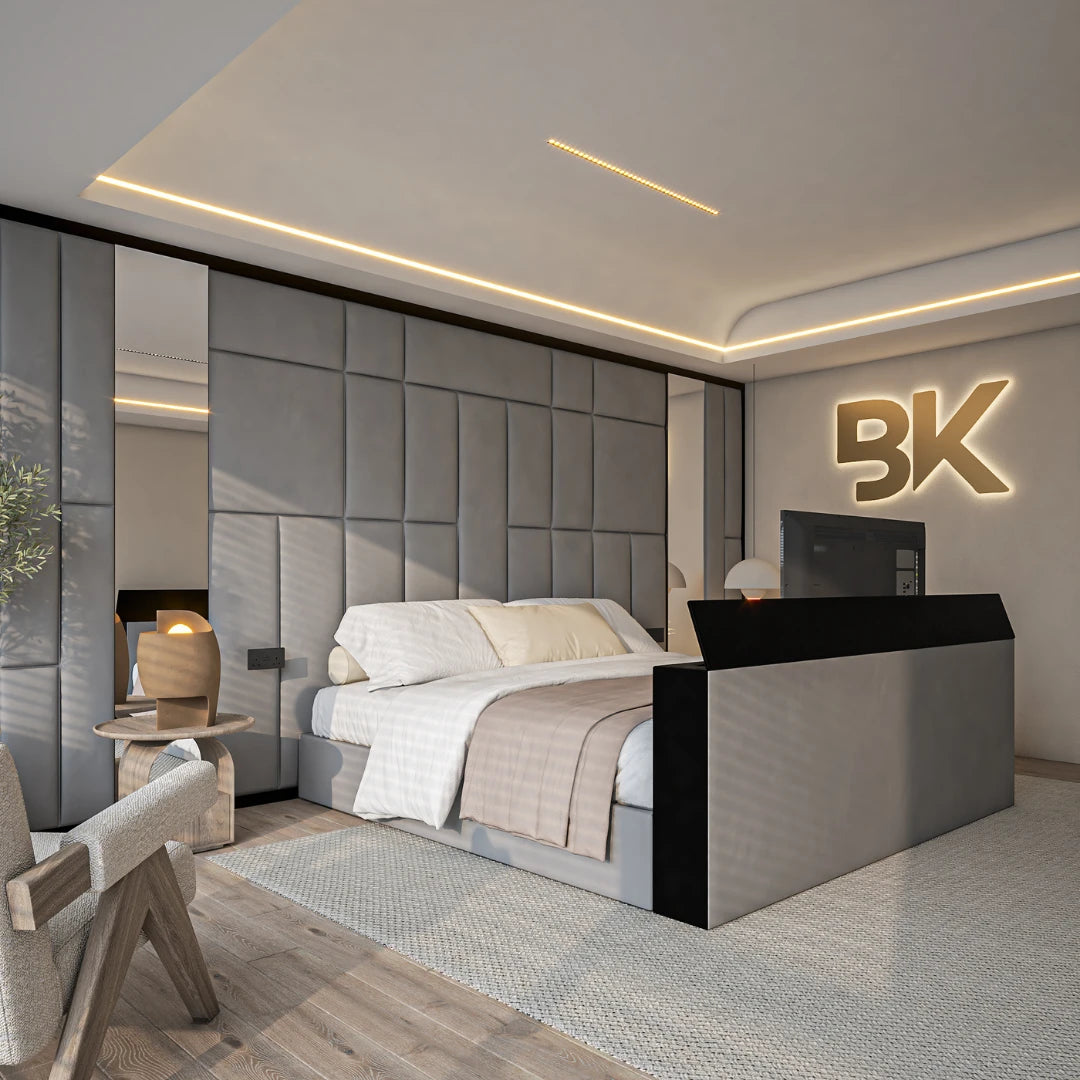 Upholstered storage bed with wall panels, integrated TV lift, and decorative mirrors.