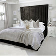 Upholstered bed frame in super king size and black crushed velvet made by Bedroomking