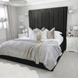 Upholstered bed frame in super king size and black plush velvet made by Bedroomking