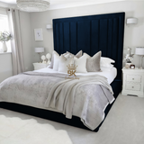 Storage upholstered bed frame in blue plush velvet made by Bedroomking 