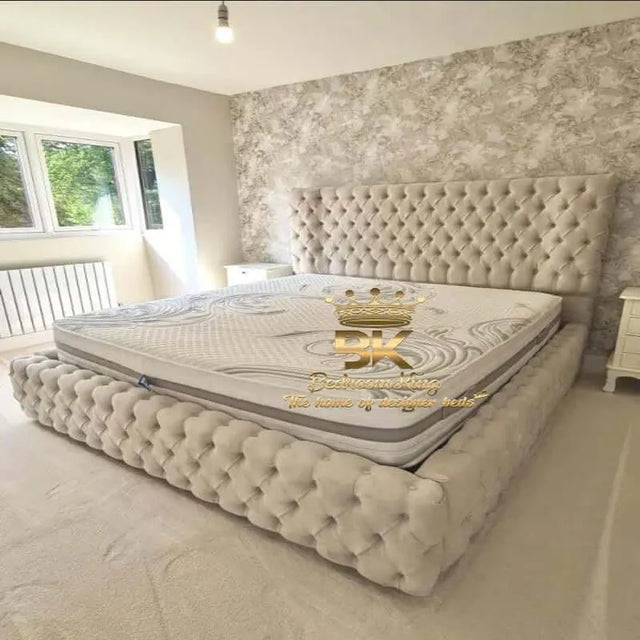 Bed frame with high headboard and low foot in cream plush velvet