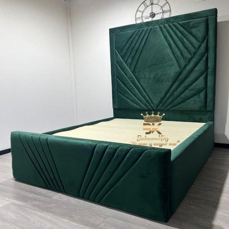 Grand bed frame with tall headboard and high base in green plush velvet