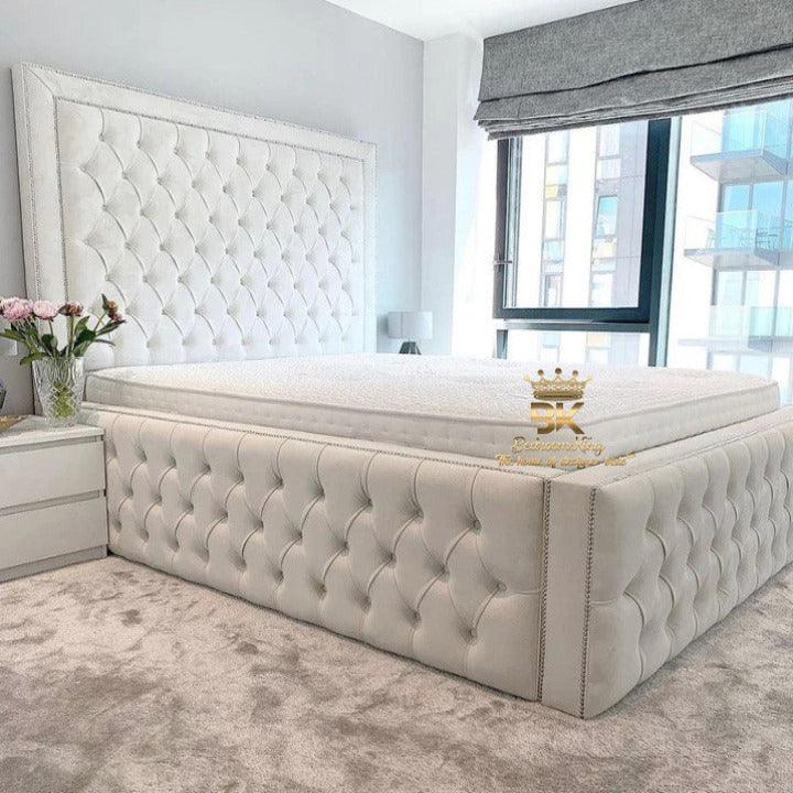 Bed frame with high headboard and footboard in silver plush velvet 