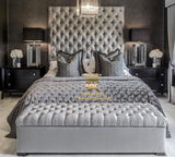 Bed frame with tall chesterfield headboard in silver plush velvet