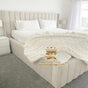 Wingback bed frame with high base in cream naples 