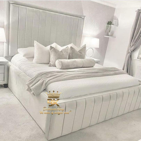 Bed frame with tall headboard and high base in silver plush velvet