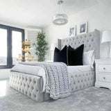 Wingback storage bed frame with tall headboard in silver plush velvet 